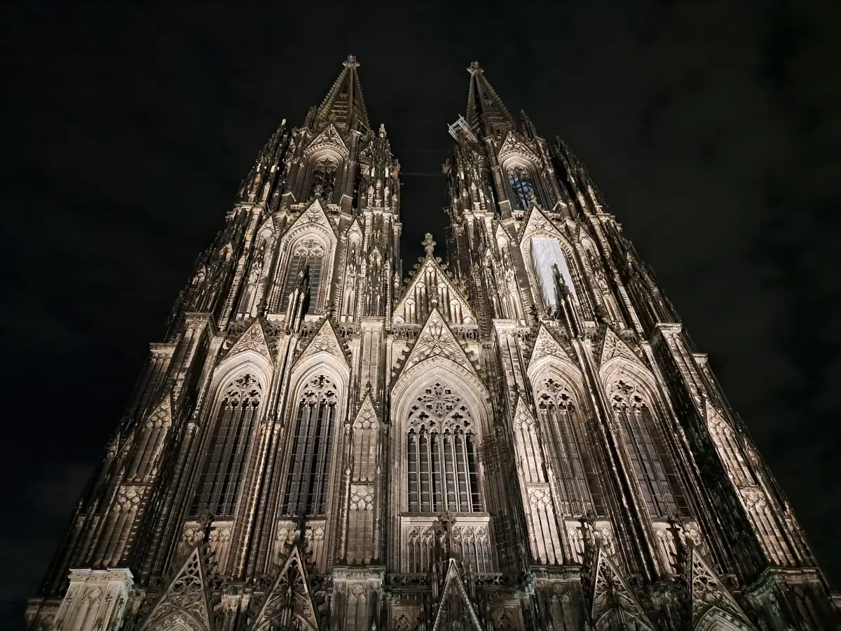 The illuminated west front at night